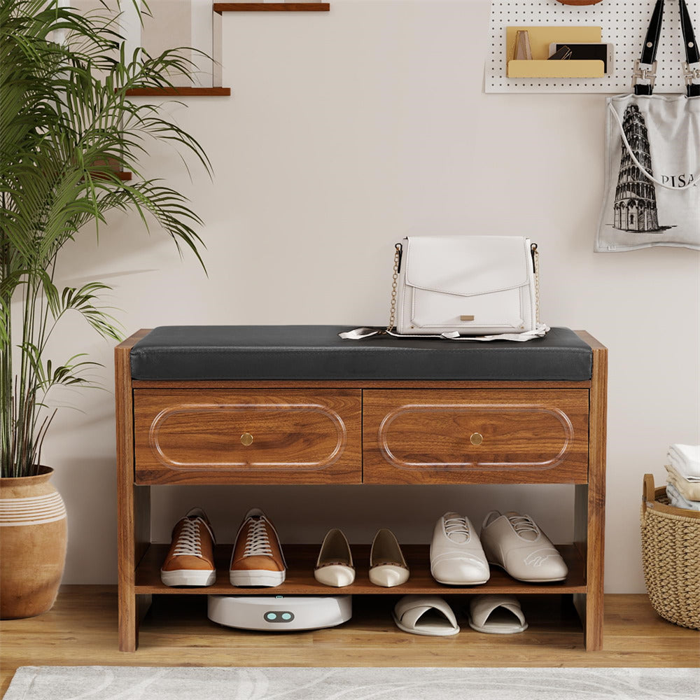 Wooden shoe cabinet with shoes on a wooden floor, plant to the left