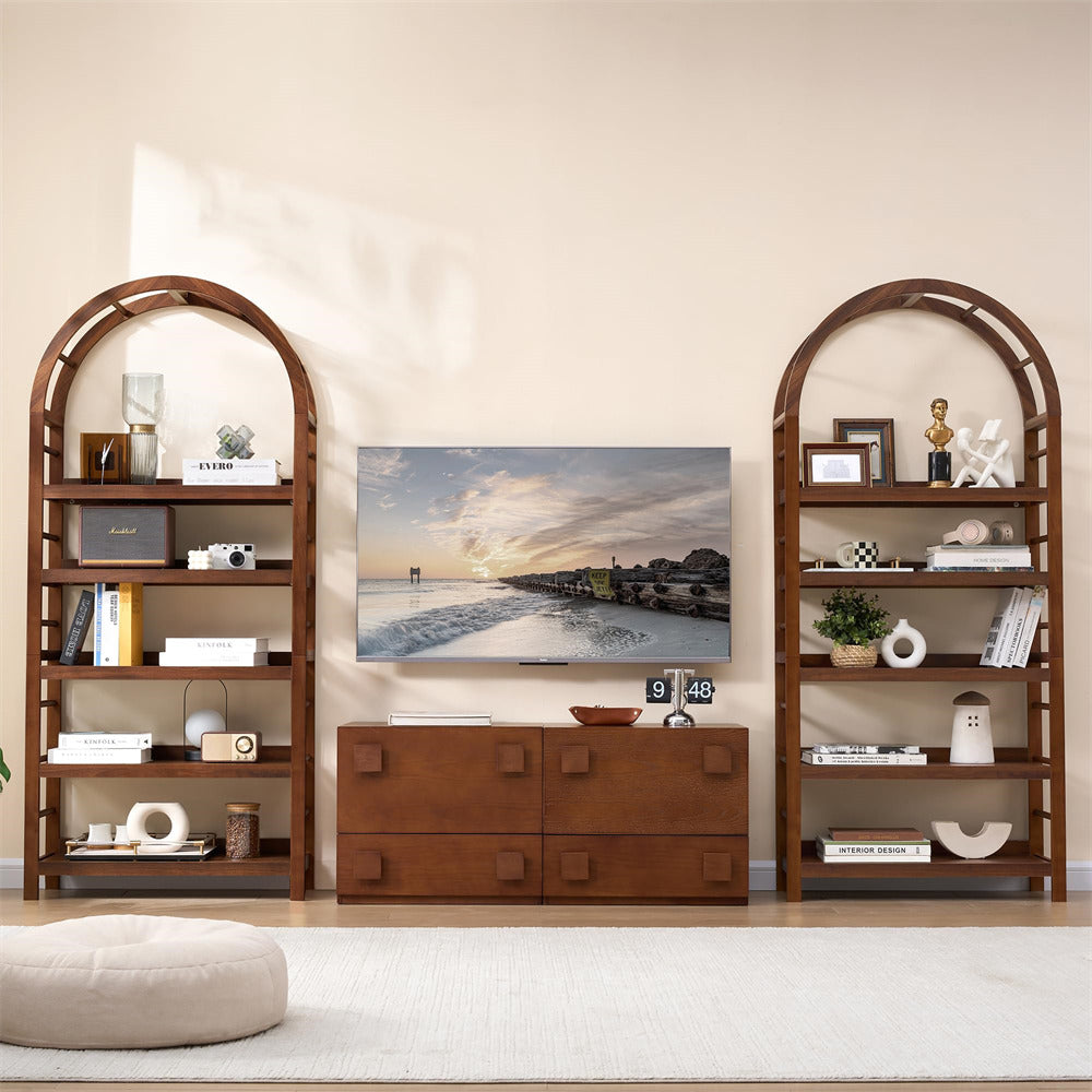 Wooden bookshelves with decorative items in a living room setting.