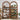 Wooden bookshelf with decorative items against a white wall