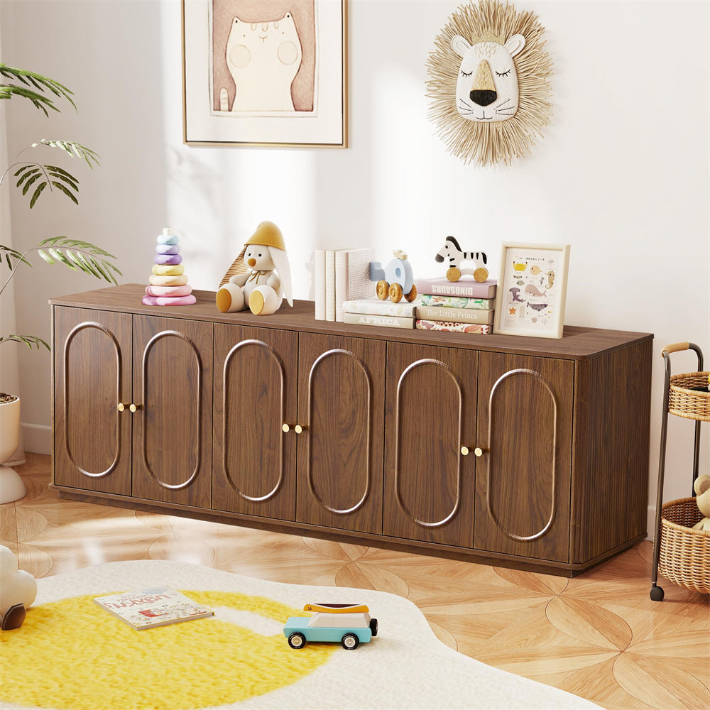 Wooden cabinet in a room with toys and decor