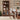 Dining room with wooden cabinet, table, and chairs.