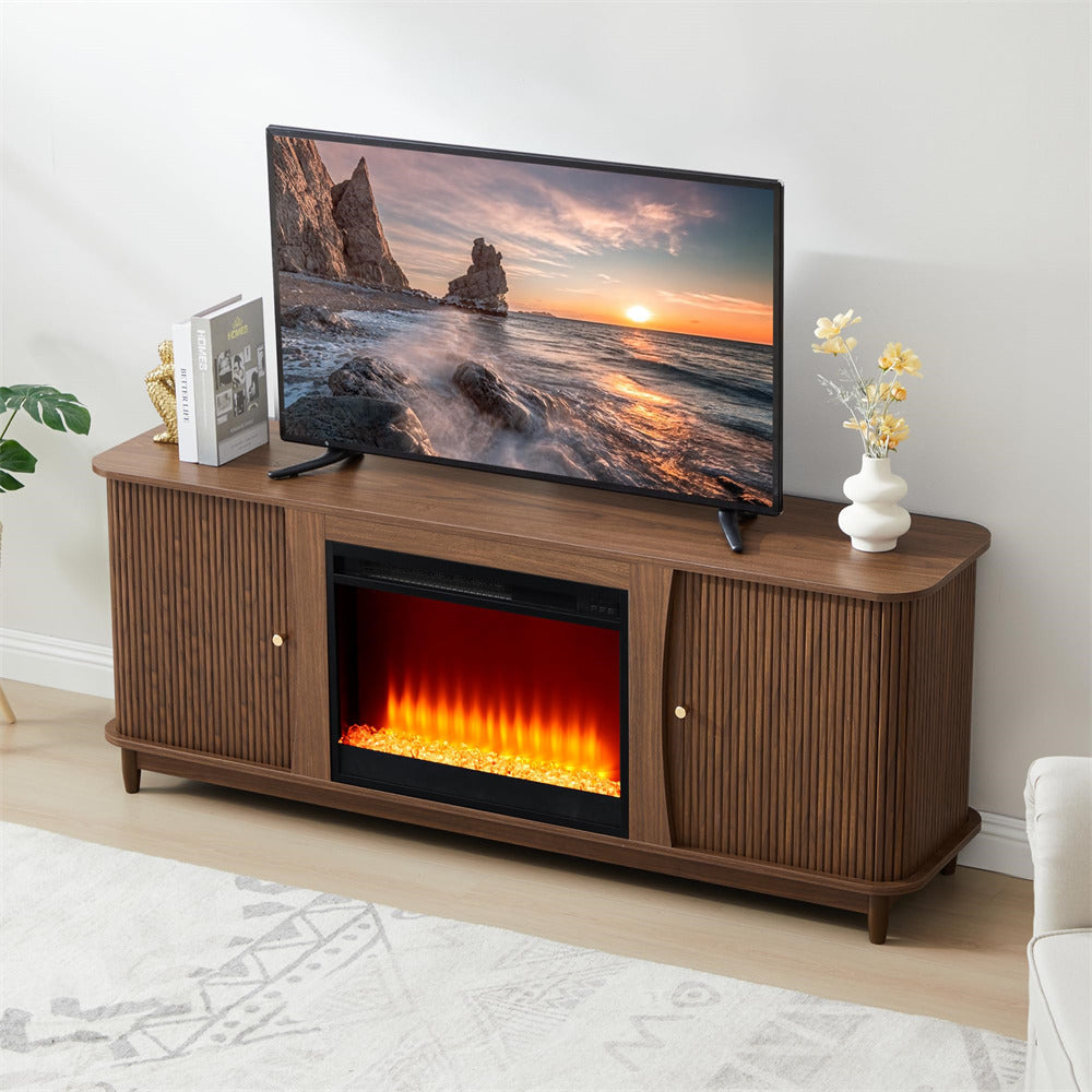 Wooden TV stand with electric fireplace and television displaying a scenic view.