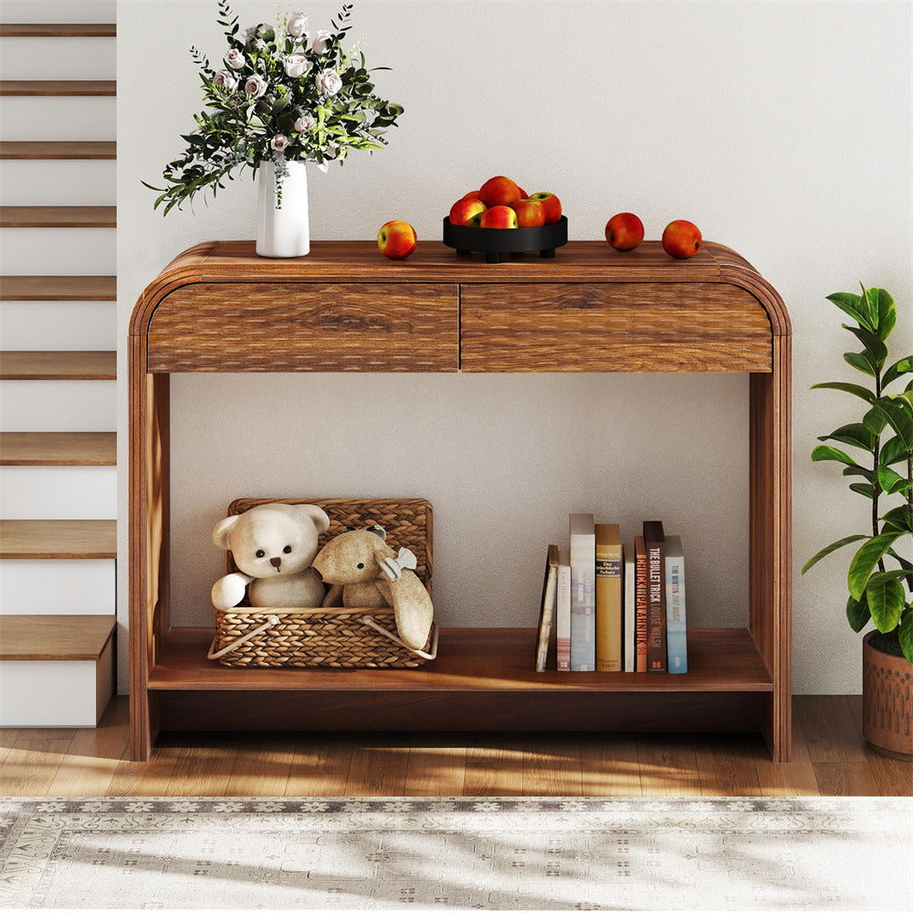Wooden console table with decorative items including teddy bears, books, and a vase.