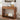 Wooden console table with decorative items in a living room setting