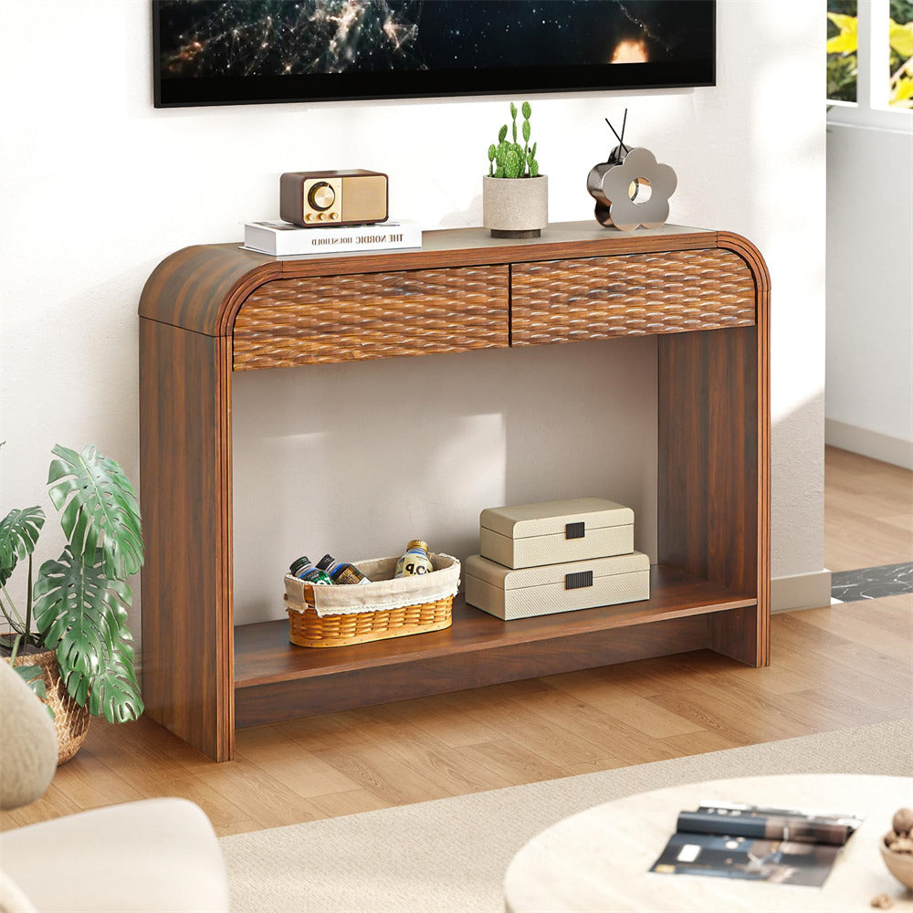 Wooden console table in a living room setting with decorative items.