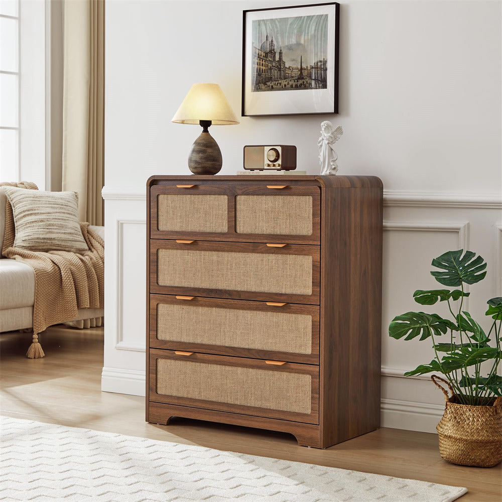 Wooden dresser with woven drawer fronts in a living room setting.