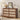 Wooden 6 drawer dressers with decorative items in a room setting