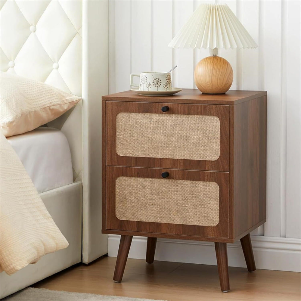 Wooden nightstand with two drawers in a bedroom setting