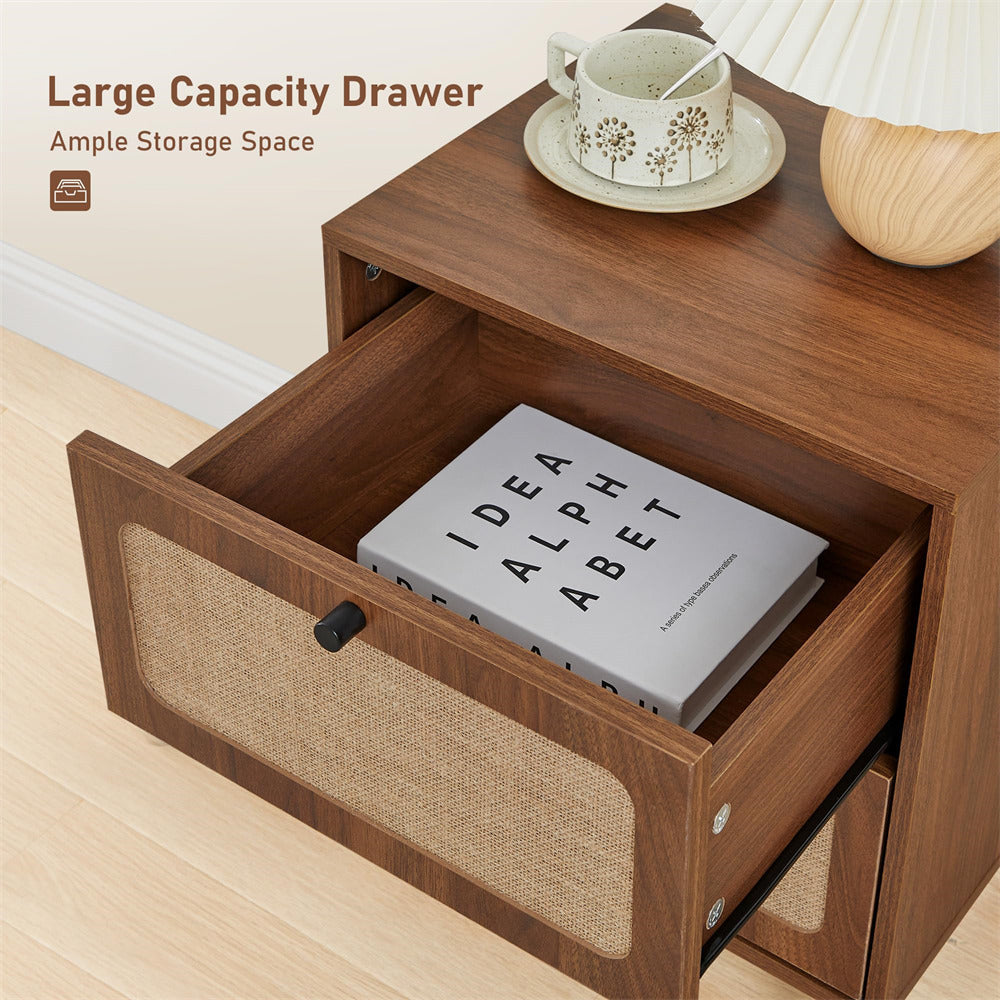 Wooden nightstand with open drawer containing a book, cup, and saucer on a light wood floor.