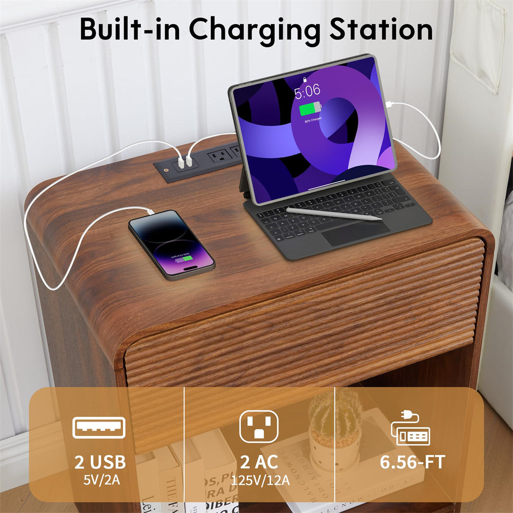 Wooden nightstand with built-in charging station featuring a laptop and smartphone.