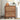Wooden shoe cabinet with two drawers in a room setting.