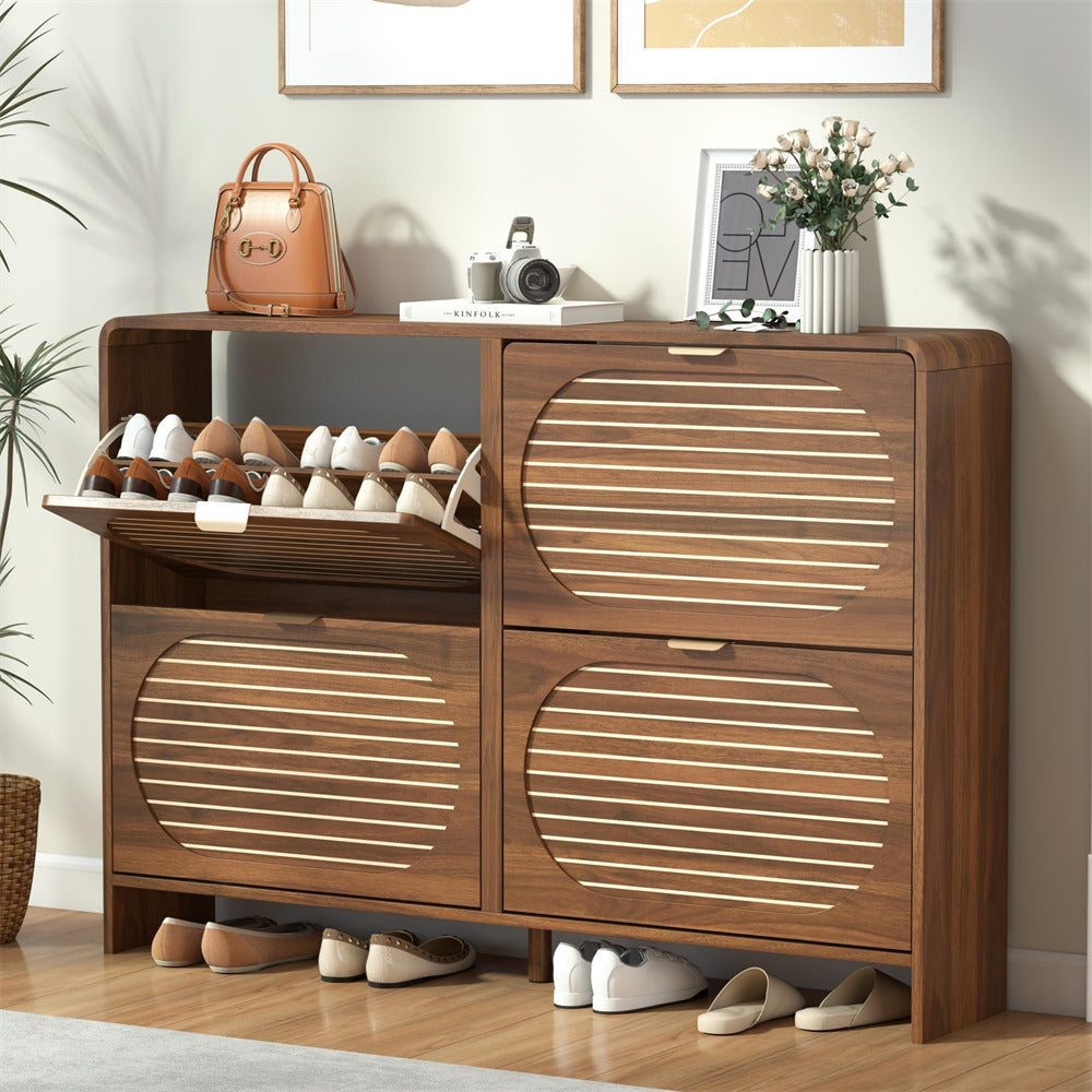 Wooden shoe cabinet with open door showing shoes, placed in a room with decor elements.
