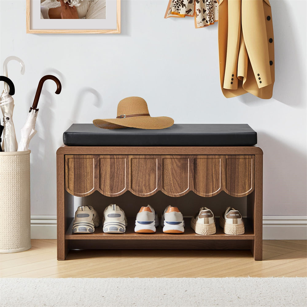Wooden shoe bench with shoes, a hat, and umbrellas in a room setting.