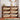 Wooden shoe rack with multiple shelves in a room setting.