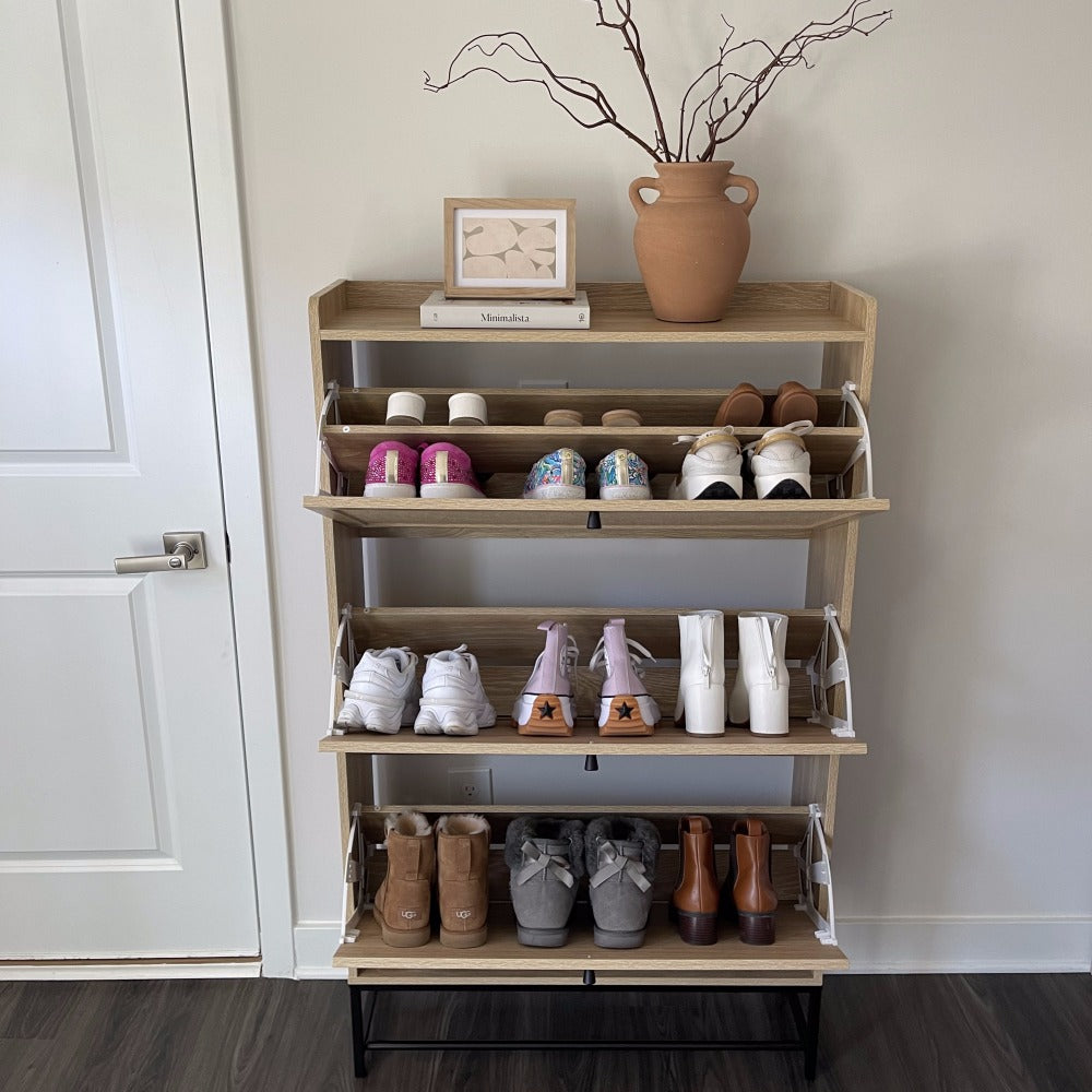 Wooden shoe rack with various shoes on a wooden floor.