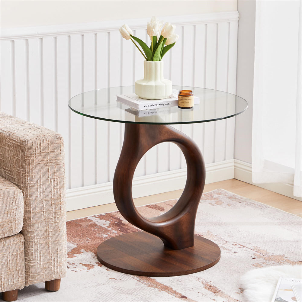 Glass side table with wooden base in a living room setting