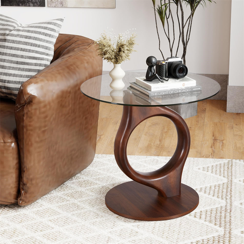 Wooden side table with glass top in a living room setting