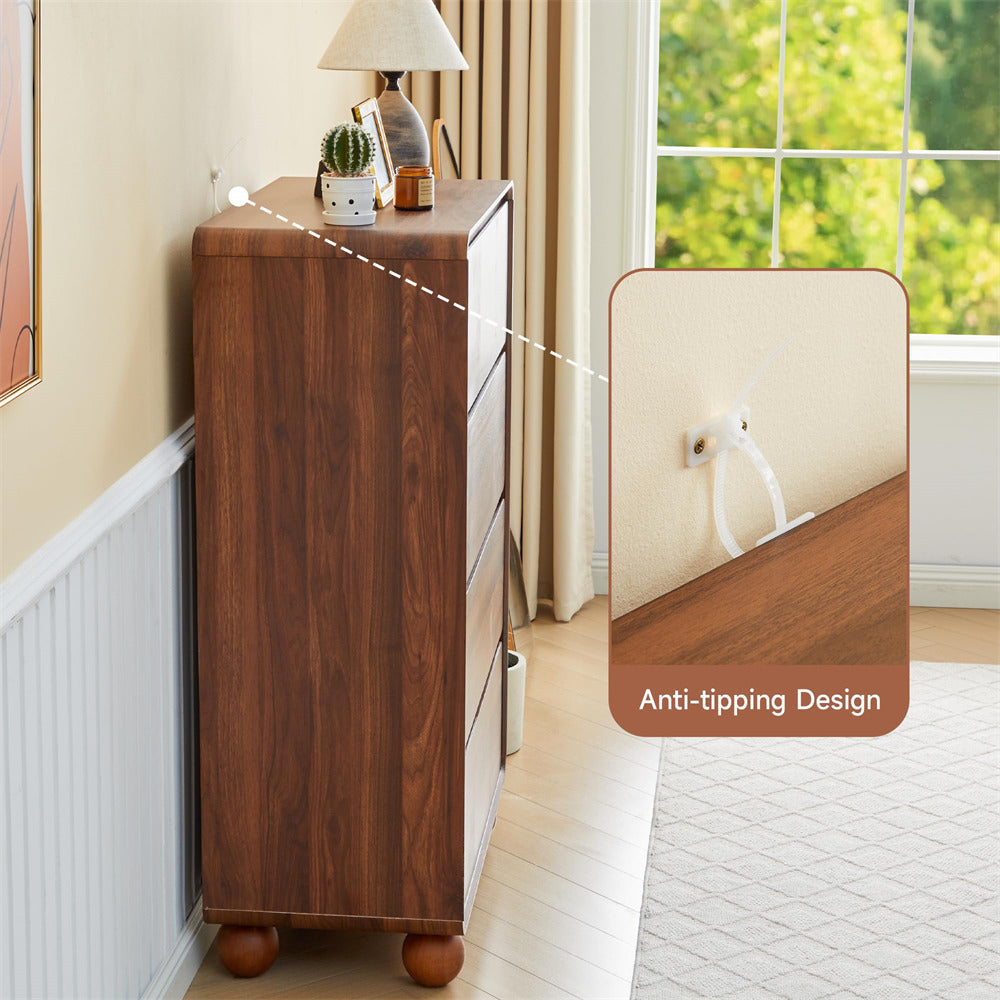 A tall wooden chest of drawers in a warm medium-brown finish stands in a styled room corner beside a window. The image includes a callout inset showing a white hook mounted on the wall, with text reading 'Anti-tipping Design' and a dashed line connecting it to the product.