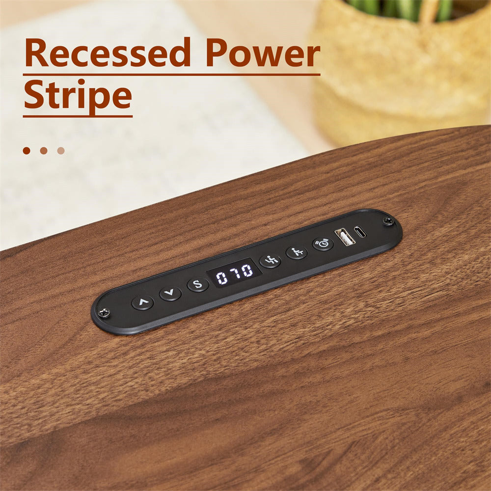 A close-up of a wooden tabletop with a recessed black control panel featuring buttons, a small digital display, and a USB port. Text in the upper left reads 'Recessed Power Stripe'.