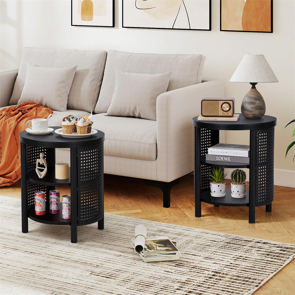 Living room with a beige sofa, black side table, and decorative items.