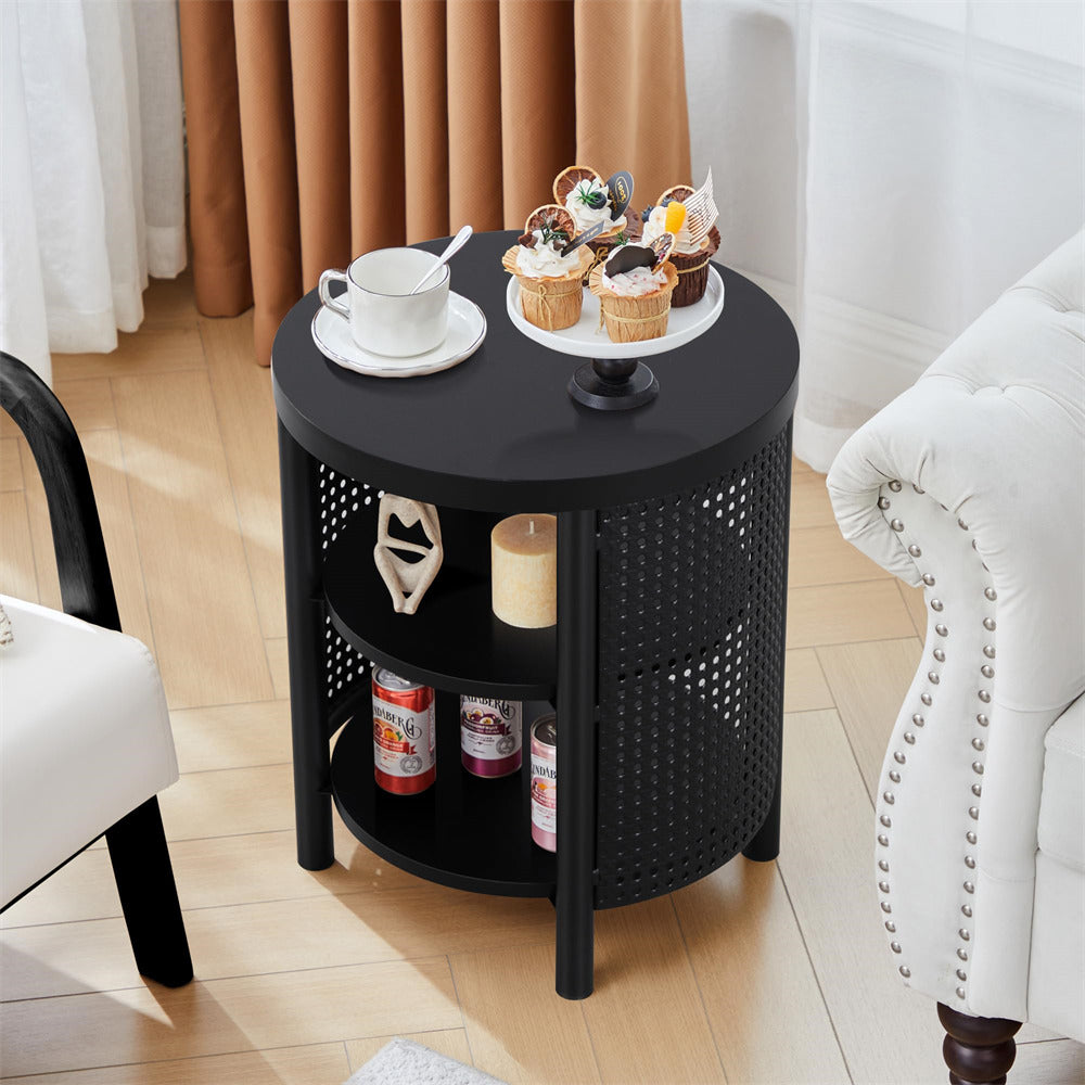 Round black side table with shelves in a living room setting