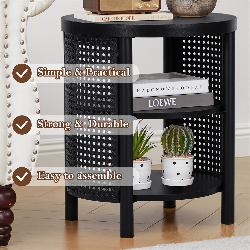 Black side table with perforated design, books, and plants in a room setting.