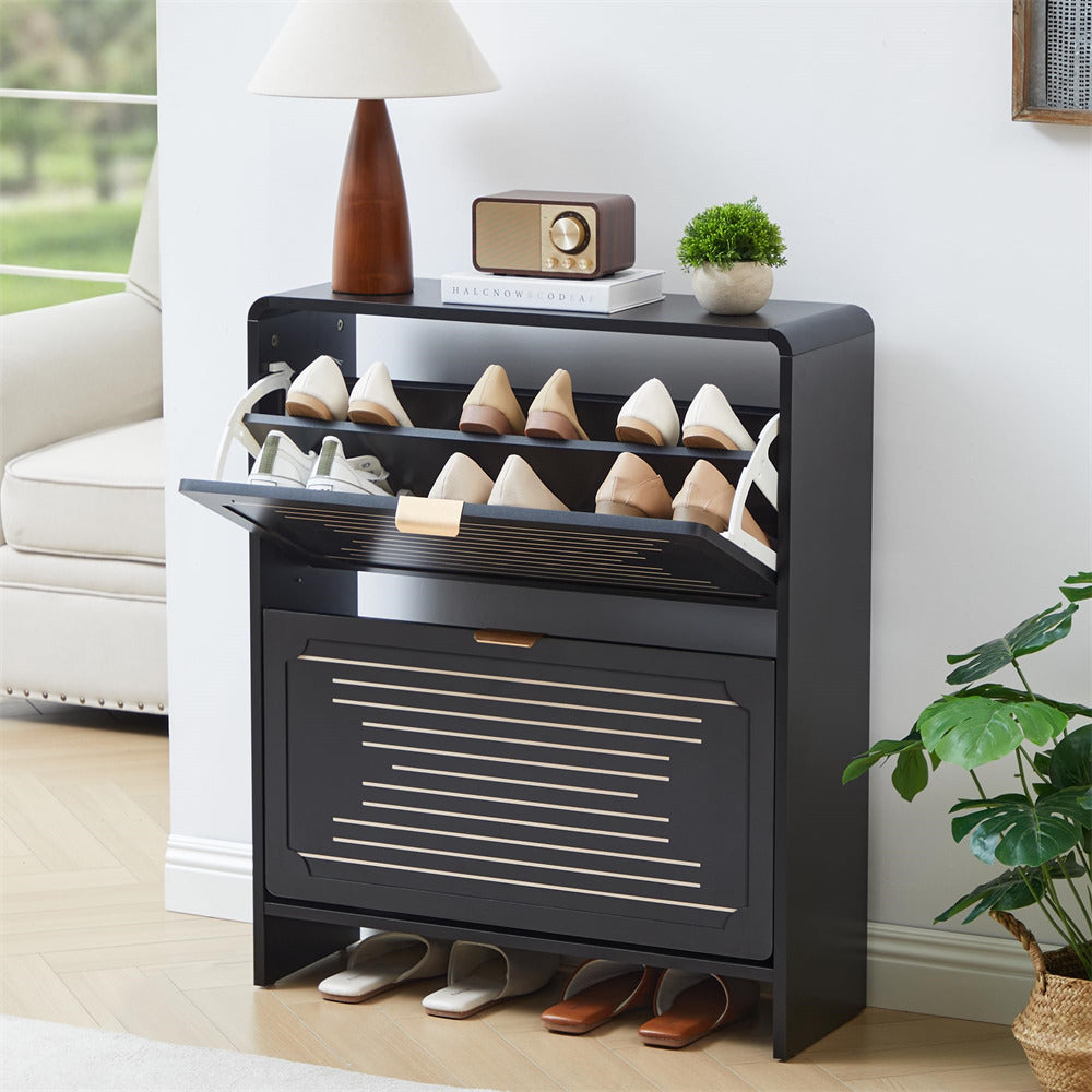 Black shoe cabinet with open door showing shoes inside, placed in a living room setting.