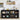 Black kitchen island with various appliances and items in a home setting