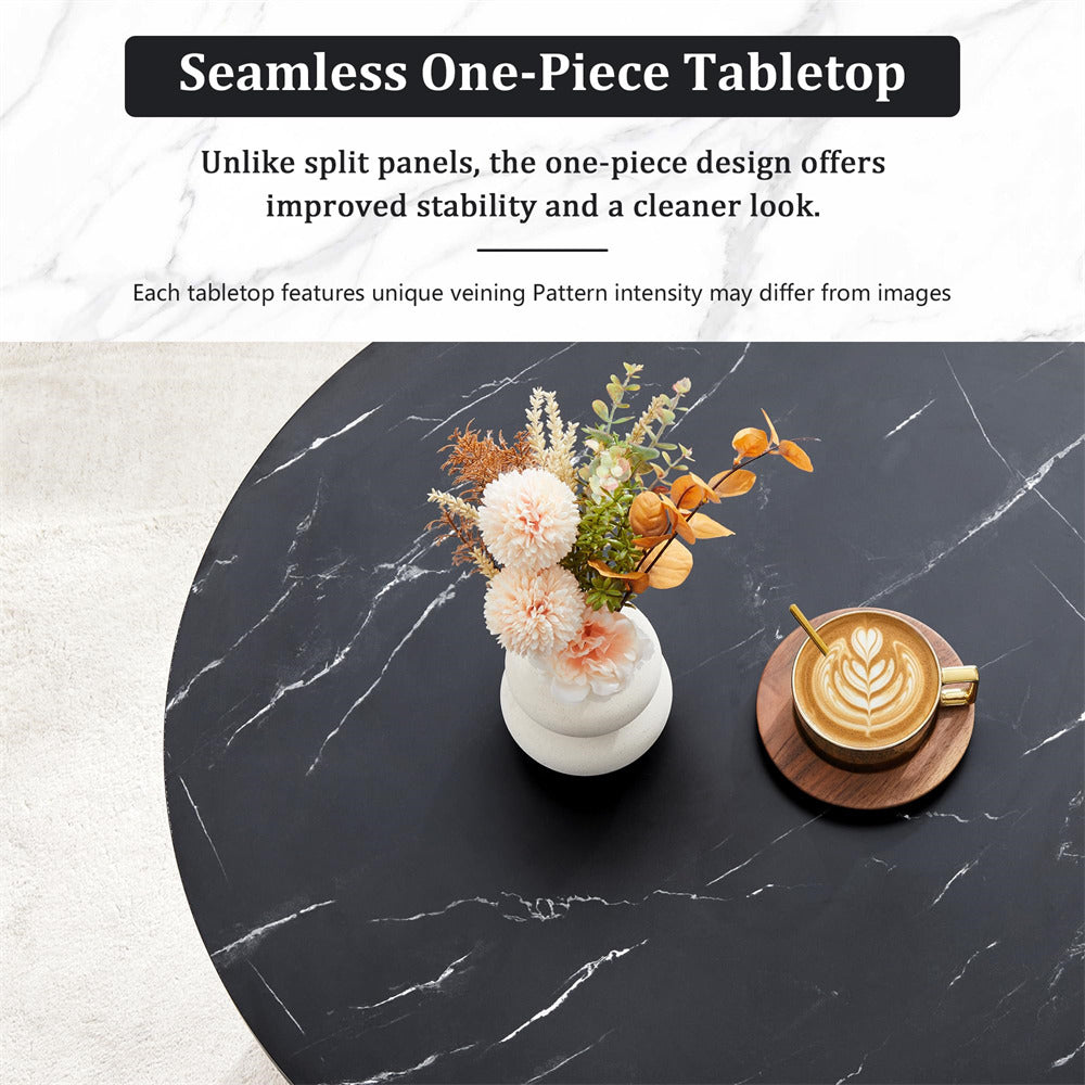 Black marble table with a vase of flowers and a coffee cup with latte art.