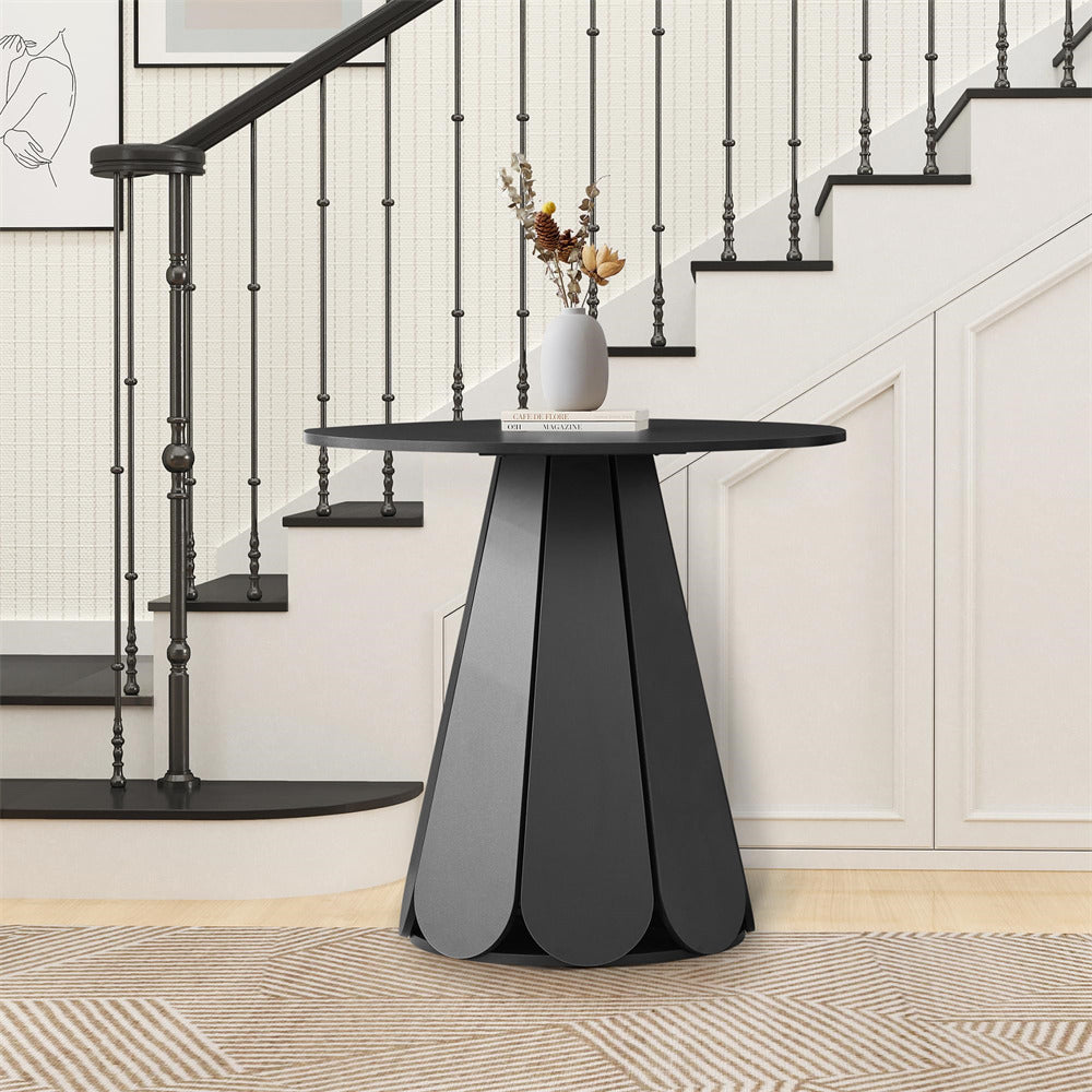 Modern black side table with a vase of flowers in a home setting