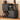 Black record player stand with vinyl records, a turntable, and speakers on a wooden floor.