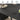 Black 42"-105" Kitchen Extendable Oval Dining Table for 4-12 with Fluted Pedestal Base & Reinforced Metal Support Leg