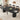 Black 42"-105" Kitchen Extendable Oval Dining Table for 4-12 with Fluted Pedestal Base & Reinforced Metal Support Leg