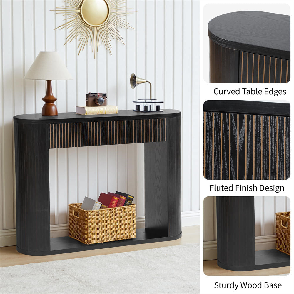 Black console table with fluted finish design in a room setting