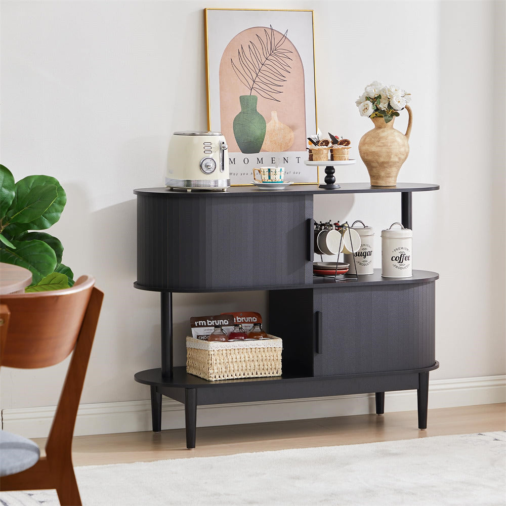 Black console table with decorative items in a living room setting