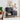 Black console table with decorative items in a living room setting