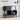 Black TV stand with measurements on a neutral background