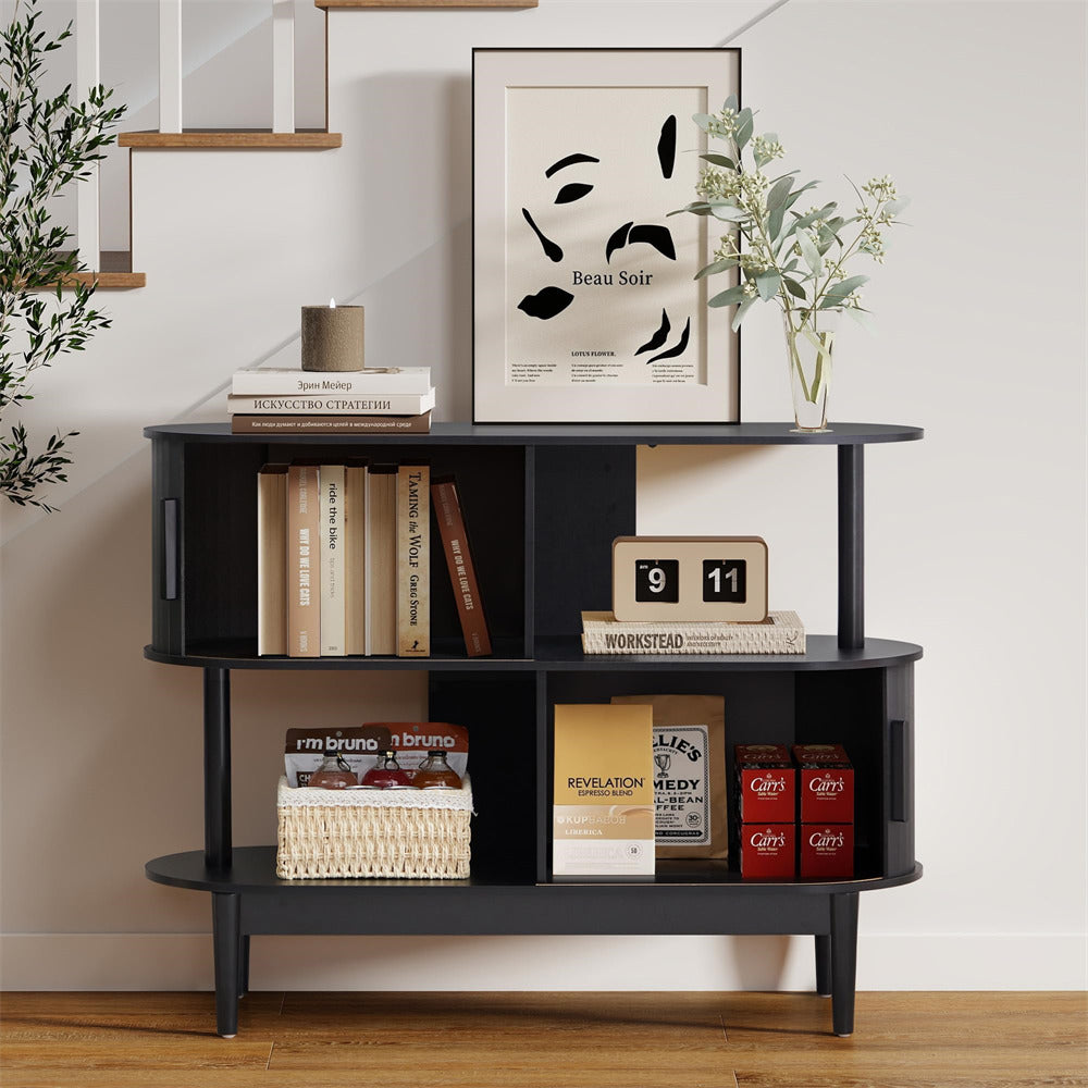 Black corner shelf with books, decorative items, and a framed picture in a room.