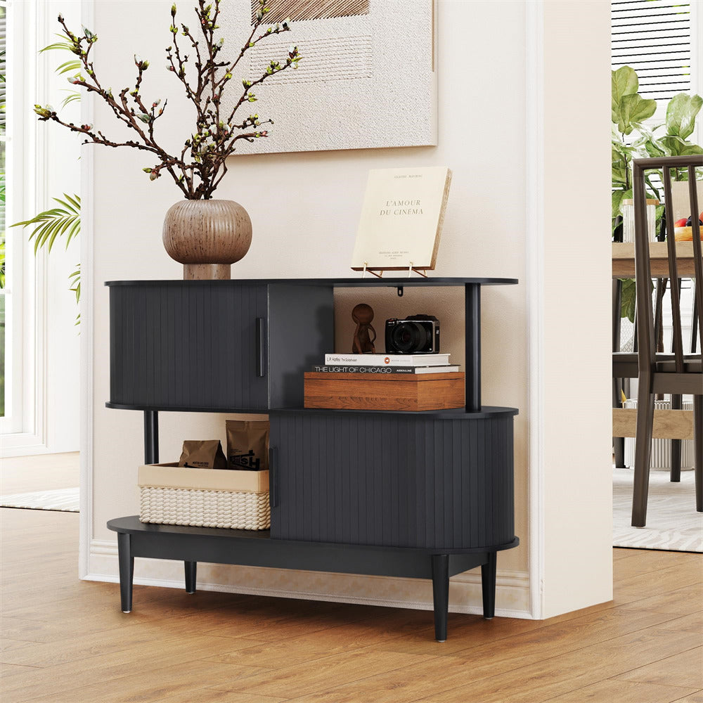 Black console table with decorative items in a living room setting
