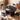 Black 43.3''-74.8'' Extendable Kitchen Dining Table for 4-8 with Removable Leaves & Fluted Base Circle
