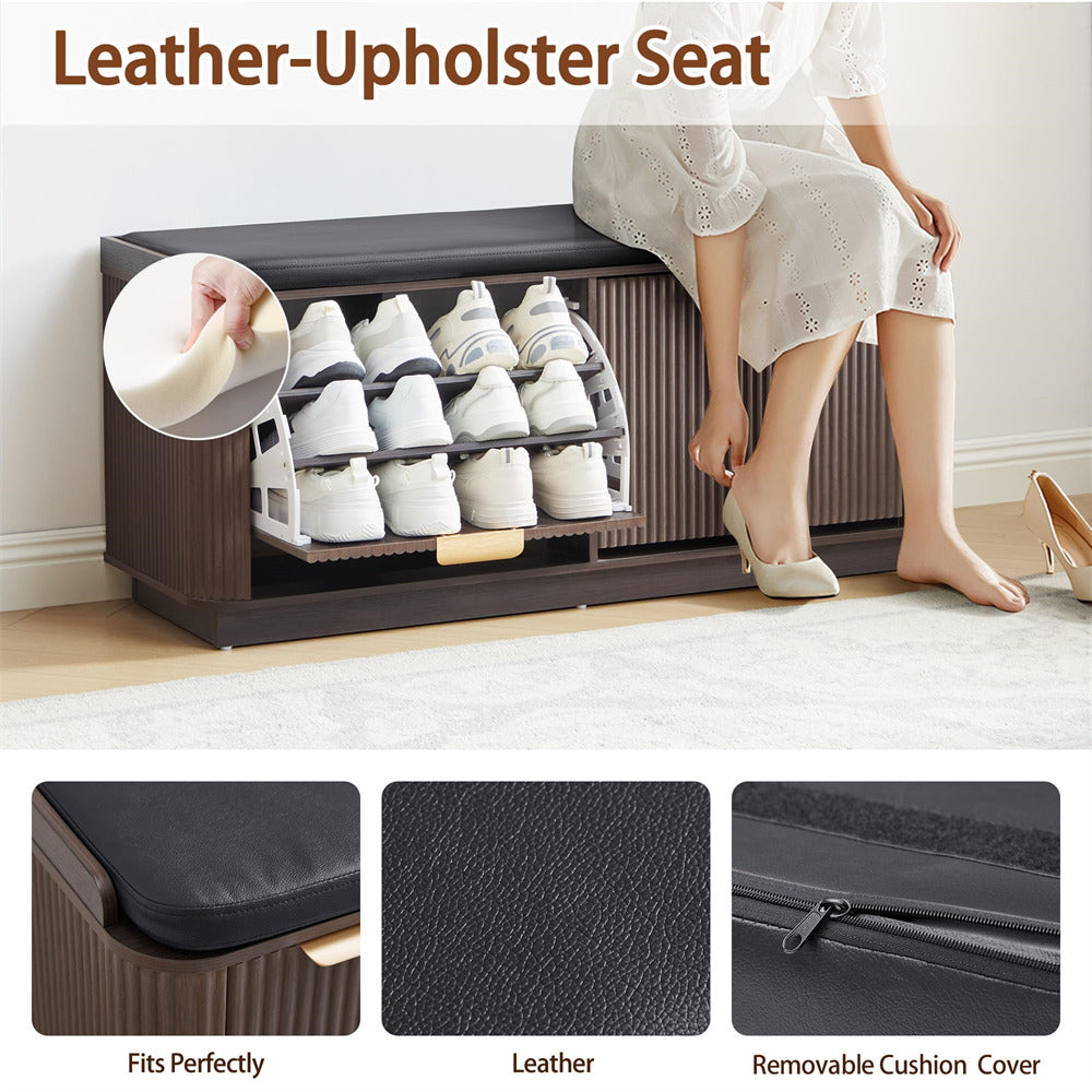 Shoe storage bench with shoe rack, leather-upholstered seat, and removable cushion cover.