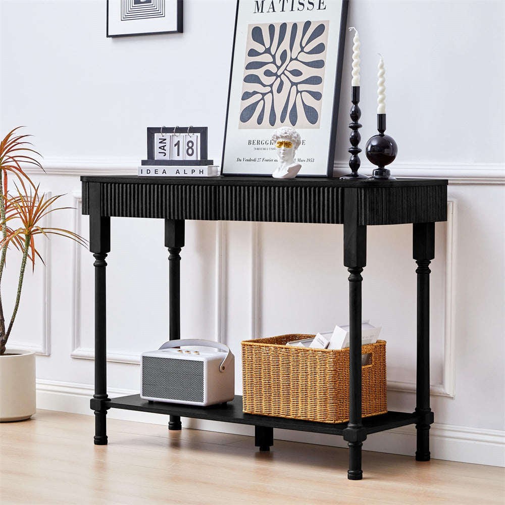 Black 43.3" console table with decorative items in a room setting