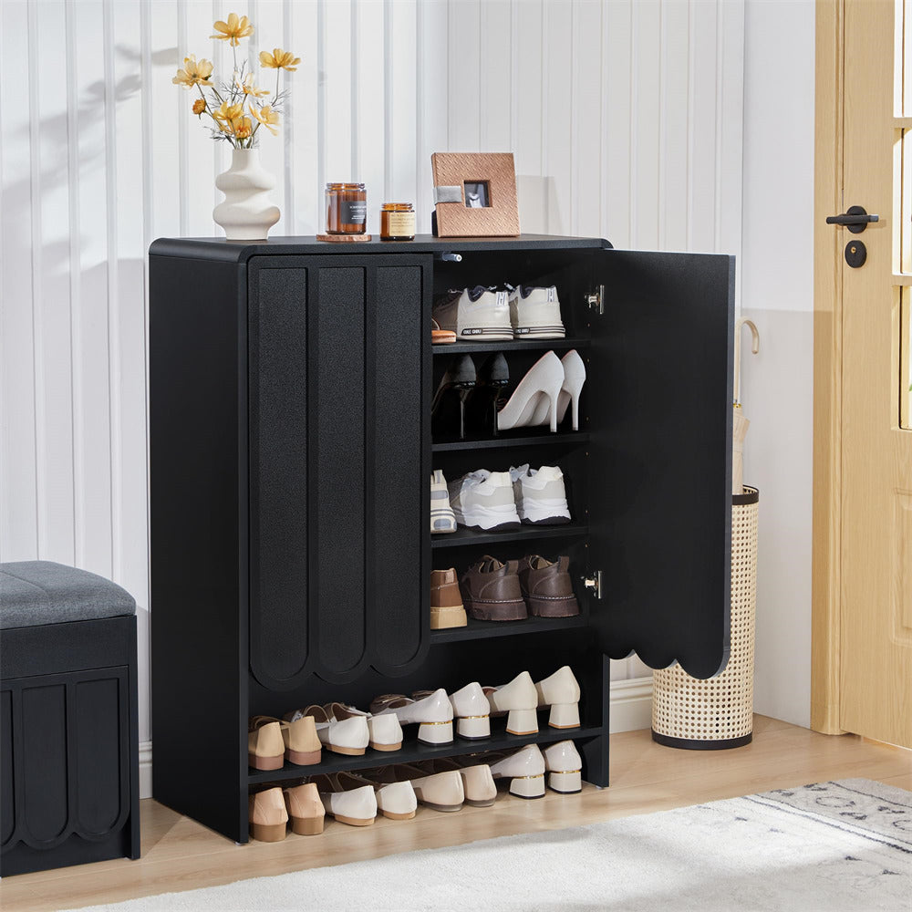 Black 5-tier wooden shoe cabinet with open doors displaying various shoes in a room setting.