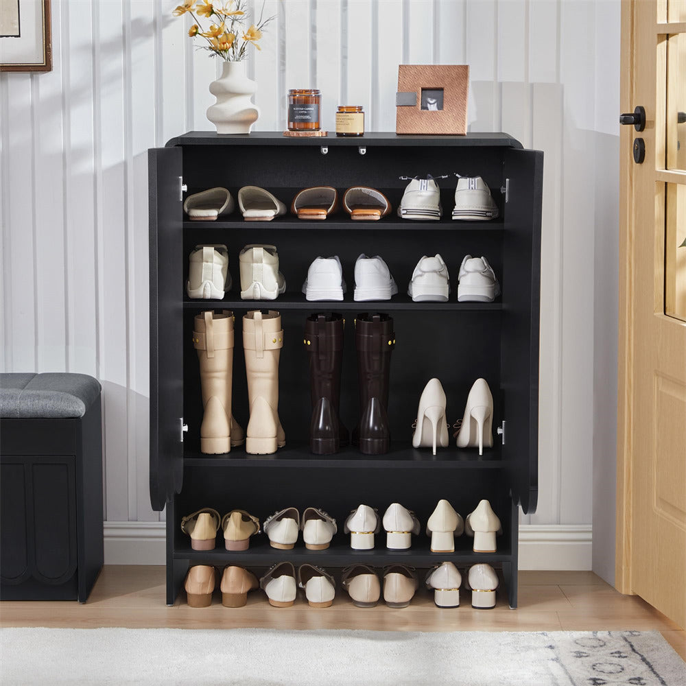 Black 5-tier wooden shoe cabinet with various shoes on shelves in a room setting.