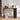 Black console table with decorative items in a room setting