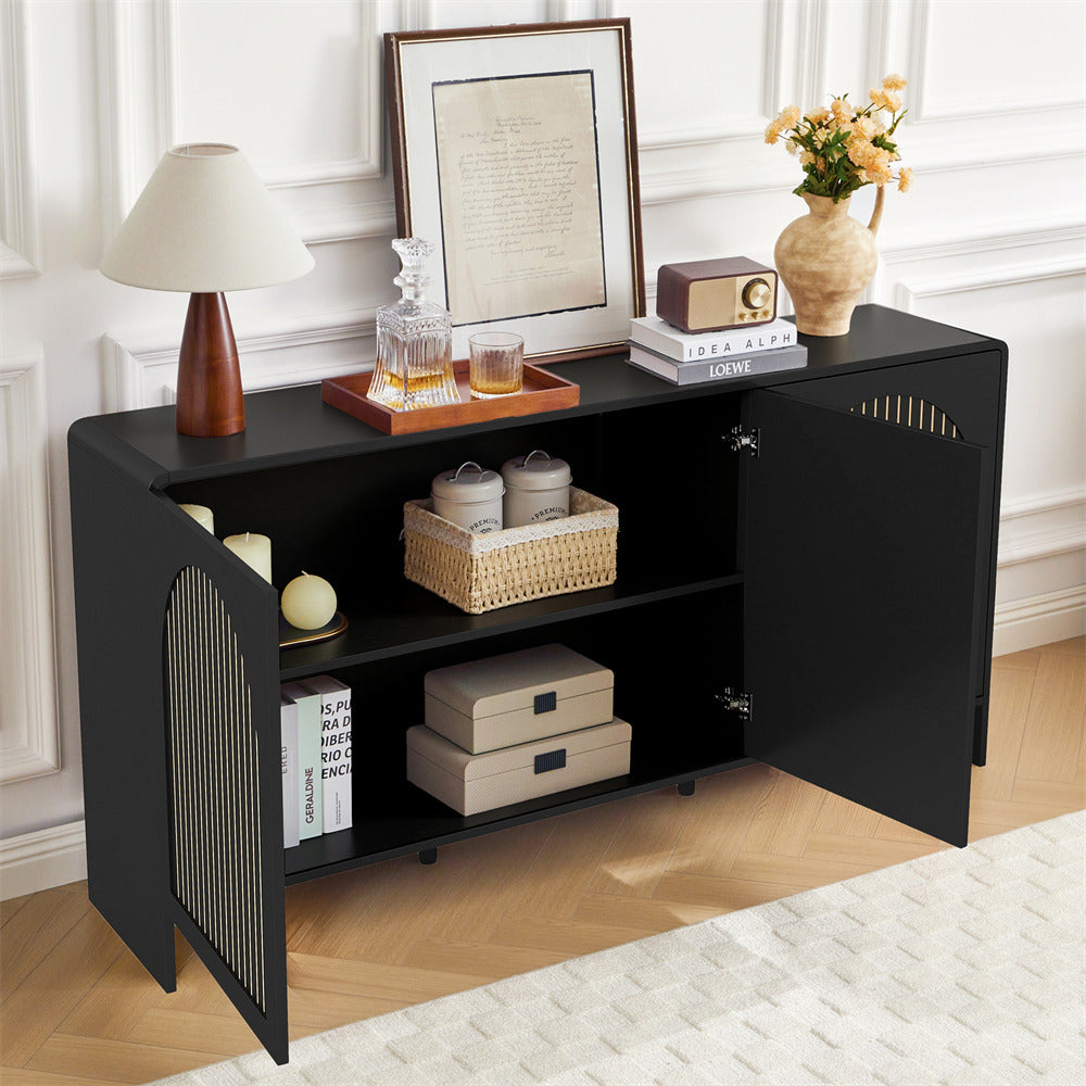 Black sideboard with decorative items in a room setting