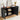 Black sideboard with decorative items in a room setting