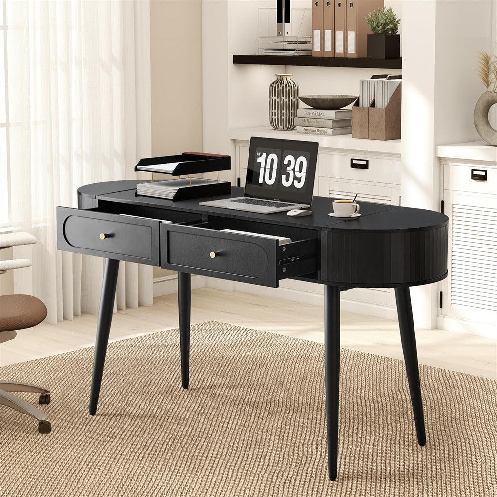Black desk with laptop, books, and a clock in a home office setting.