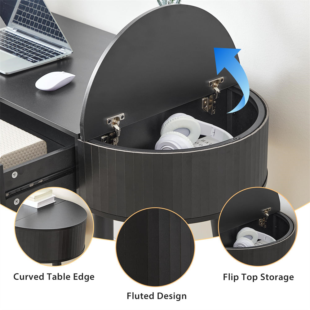 Black cylindrical storage bin with flip top on a desk, showing curved table edge and fluted design.