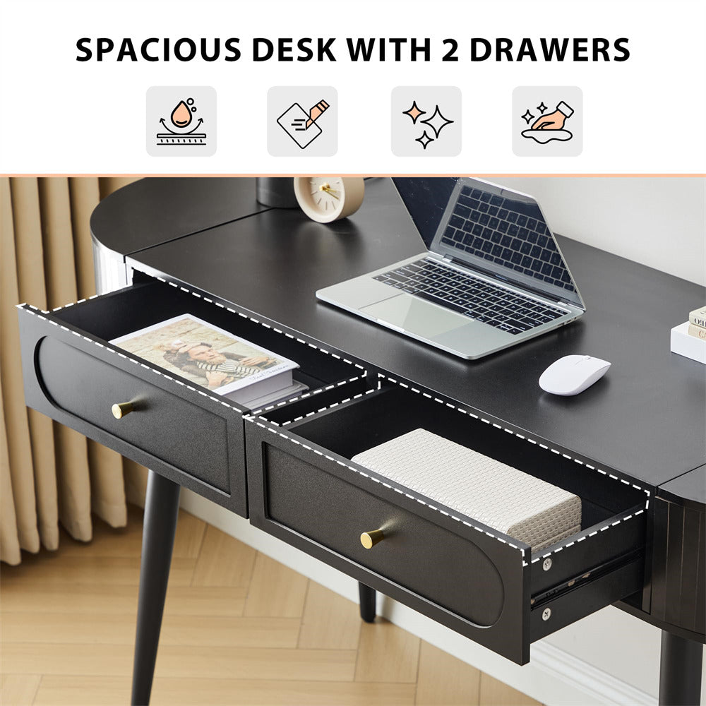 Black desk with two drawers, laptop, and office supplies on a light wood floor.